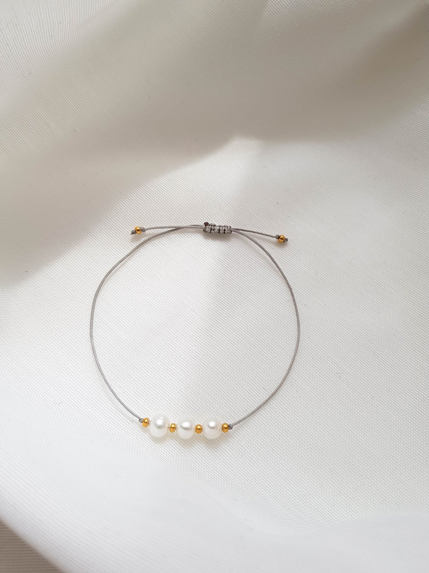 Freshwater pearl bracelet with 24k gold plated beads