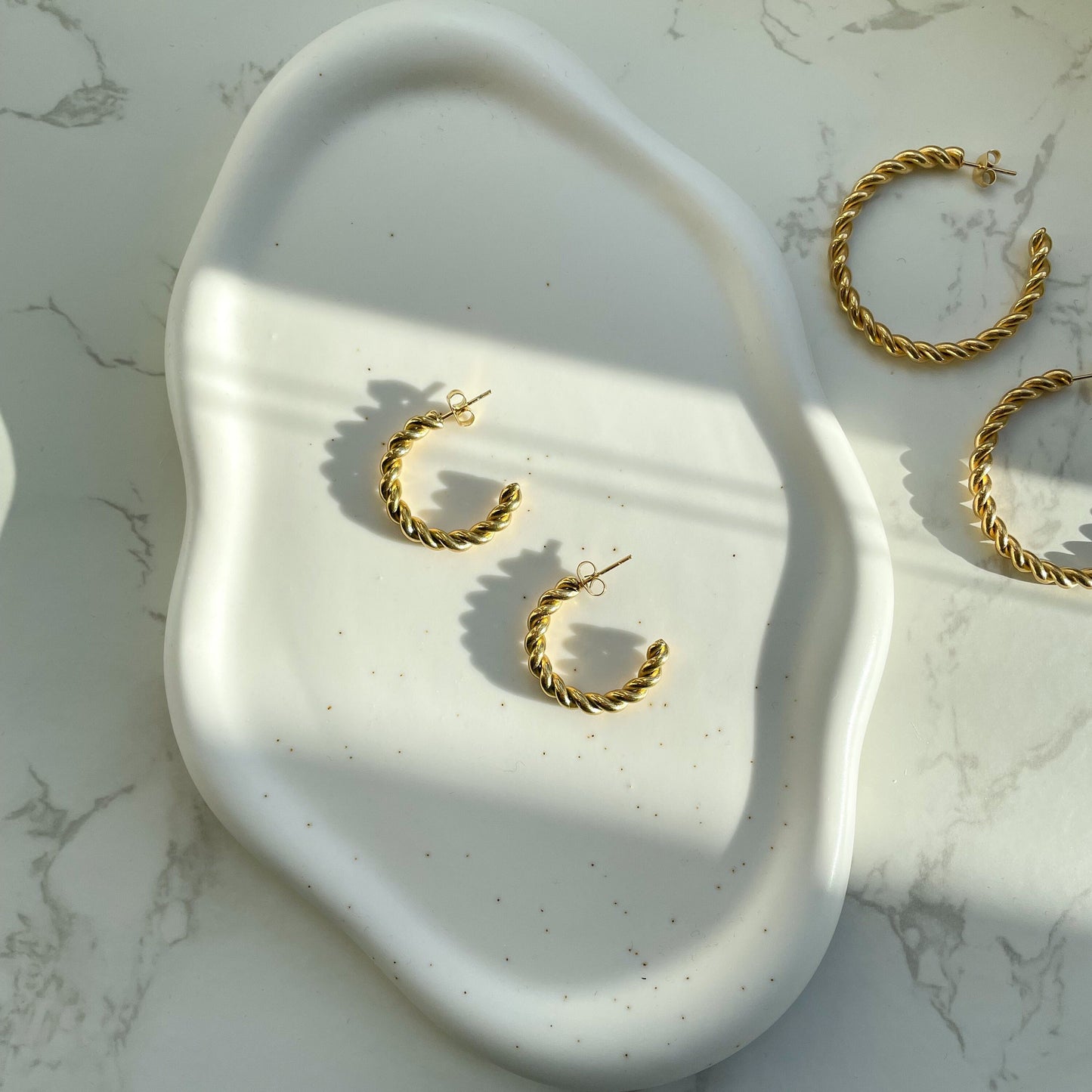 14kt gold twisted hoop earrings